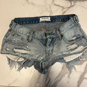Cut off Jean shorts, button-fly, super summery and flirty! Size 23, like new.